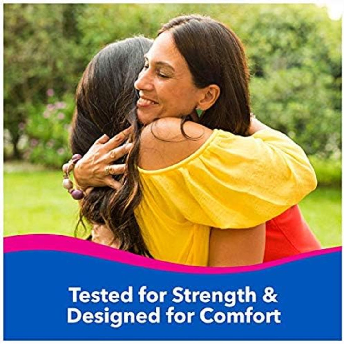 Two women hugging outdoors with a text overlay about product testing and design.