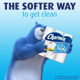 Blue bear holding Charmin Ultra Soft toilet paper with text 'The Softer Way to Get Clean' on a blue background.