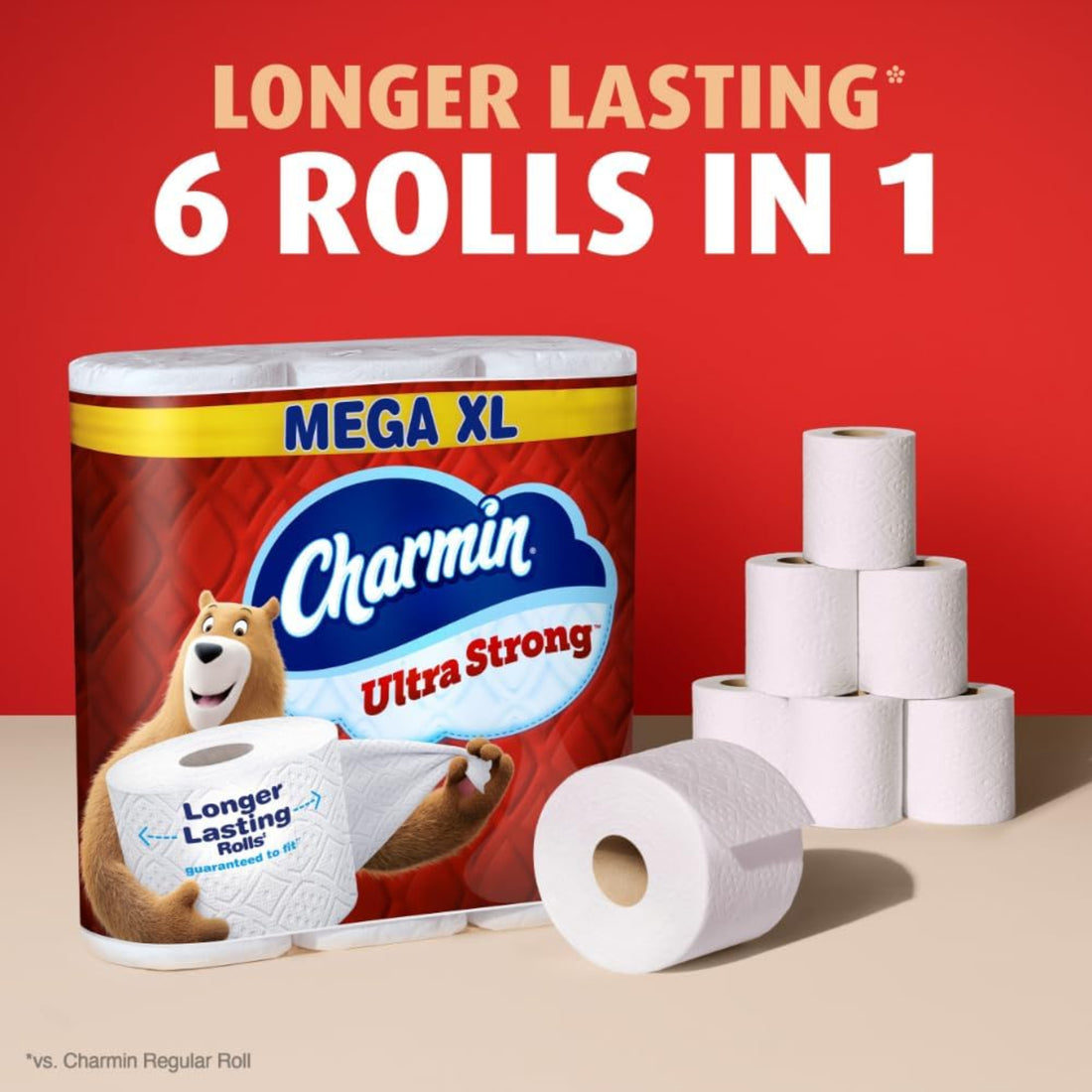 Charmin Mega XL Ultra Strong toilet paper with packaging and multiple rolls on a red background