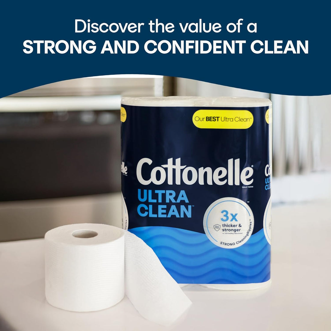 Cottonelle Ultra Clean toilet paper on a bathroom counter with a sink in the background.