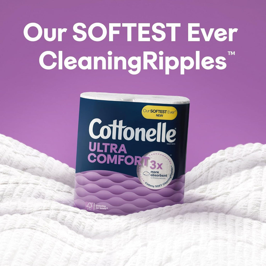 Cottonelle Ultra Comfort toilet paper package on a white fabric background with purple text.