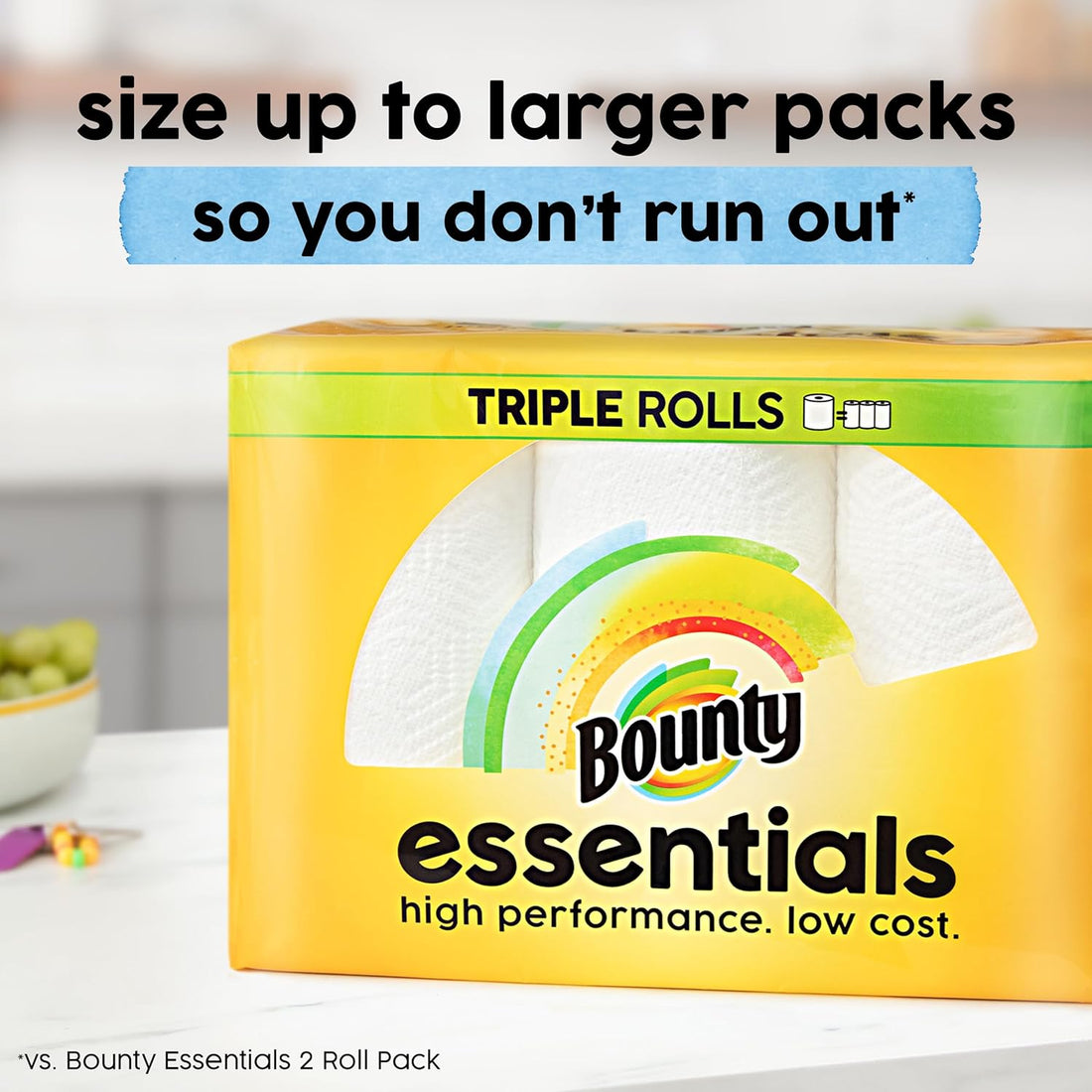 Bounty essentials paper towels packaging with text on a kitchen counter.