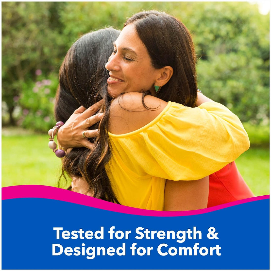 Two women hugging outdoors with a text overlay about product testing and design.