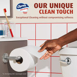Advertisement for Charmin Ultra Strong Clean Touch toilet paper with a hand reaching for a roll.