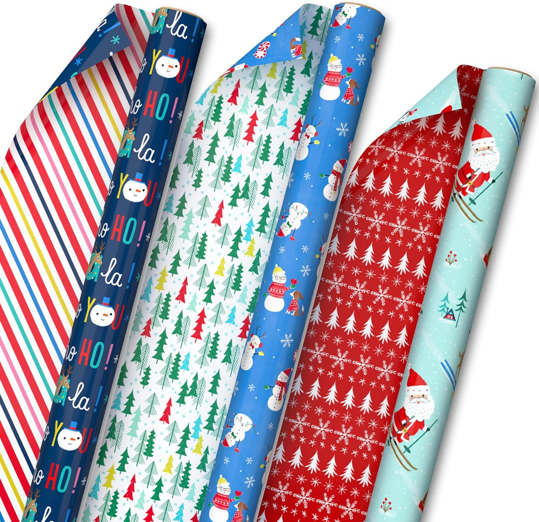 Hallmark Reversible Kids' Christmas Wrapping Paper, 3 Rolls (Skiing Santa, Penguins, Snowmen), 120 Sq Ft