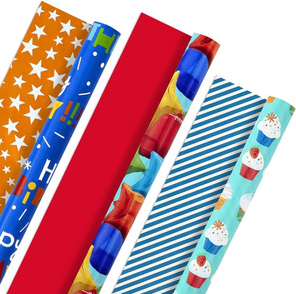 Hallmark All Occasion Reversible Wrapping Paper Bundle - Kids Birthday (3 Rolls - 75 sq. ft. ttl) Balloons, Stars, Cupcakes, Blue Stripes, Solid Red